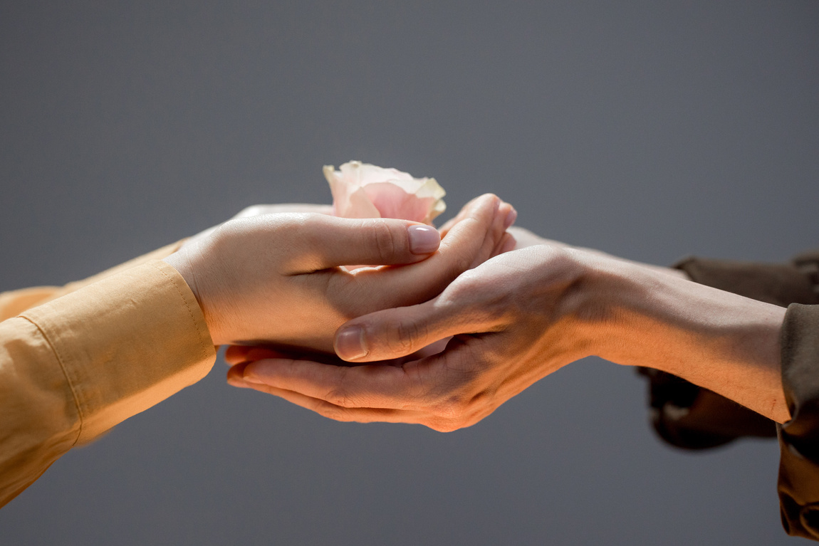 Person Holding White Tissue Paper